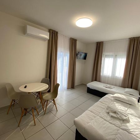 Opalium Beach Front Suites Потос Екстериор снимка